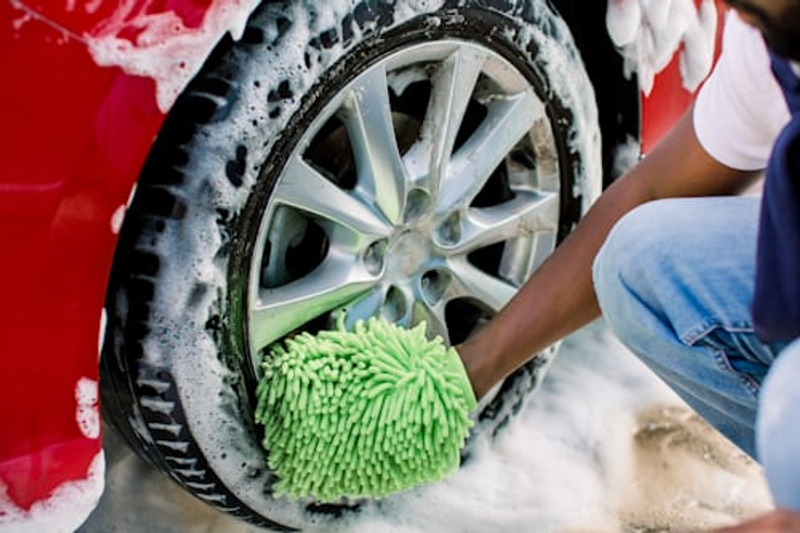WASHING RED SEDAN