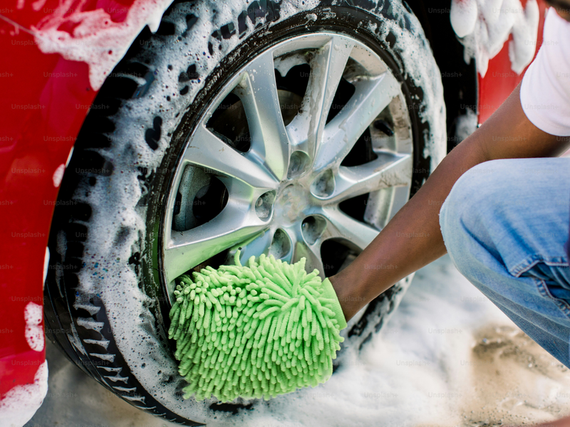 WASHING RED SEDAN